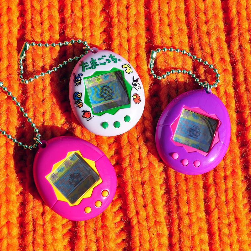 Amazon.com: Tamagotchi Original - Celebration Y3K + funda translúcida  (exclusivo de Amazon) : Juguetes y Juegos